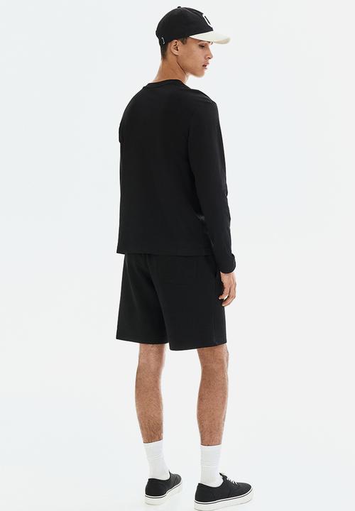 H&M - Regular fit sweatshorts - black