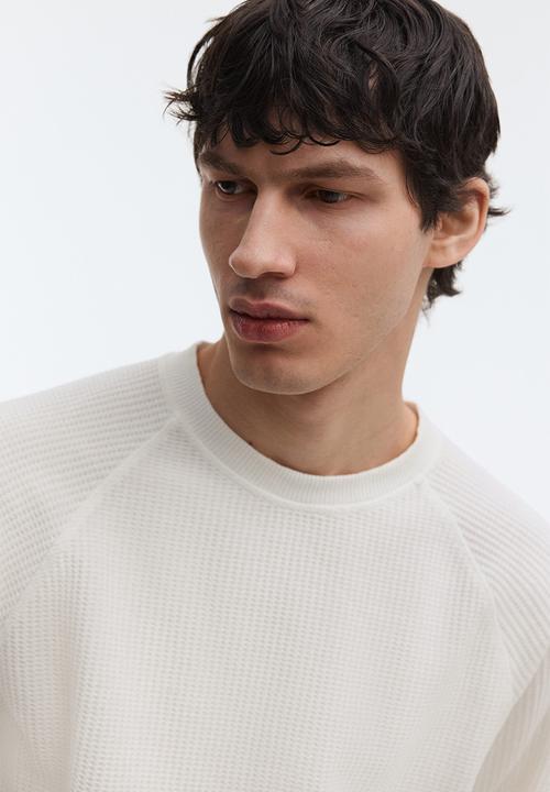 H&M - Regular fit long-sleeved waffled top - cream