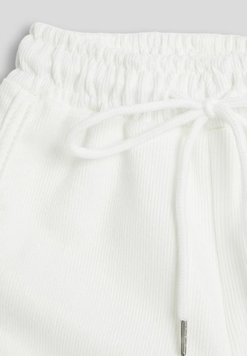 Pop Candy - Dolphin hem sweatshorts - white