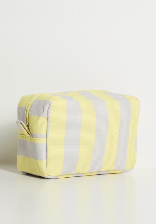 Pop Candy - Striped toiletry bag - yellow/off white
