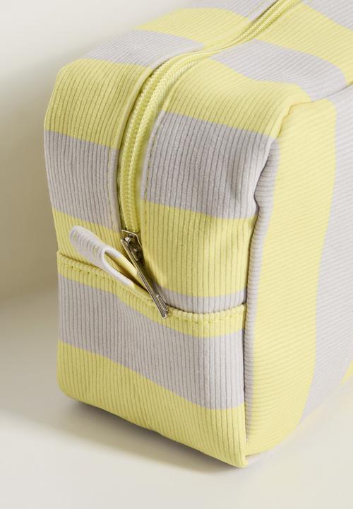 Pop Candy - Striped toiletry bag - yellow/off white