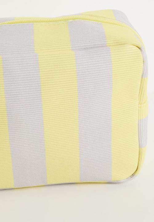 Pop Candy - Striped toiletry bag - yellow/off white