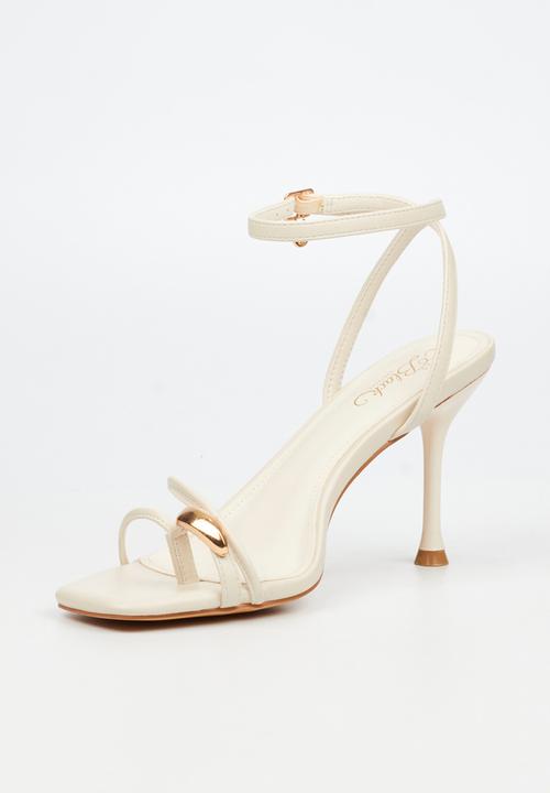 Miss Black - Chanel 6 gold trim strappy heel - ivory