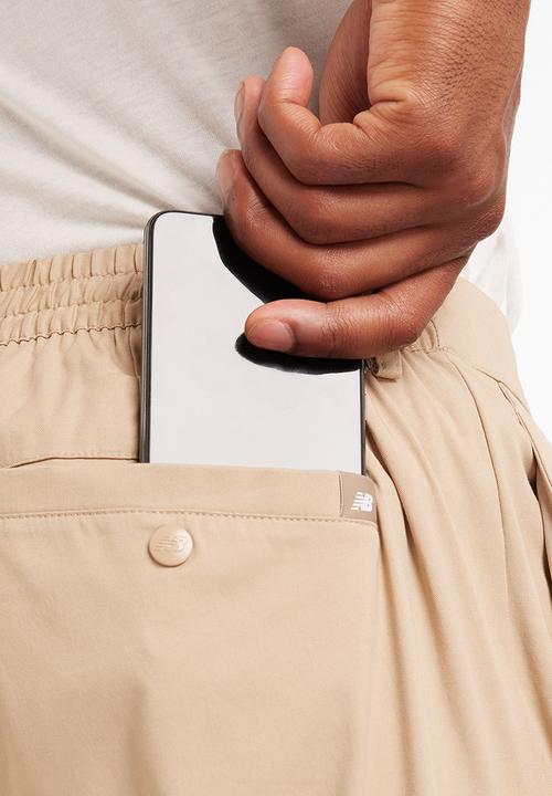 New Balance  - NB Athletics Tapered Pant - Brown