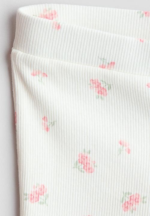 H&M - Flared leggings - white/pink floral
