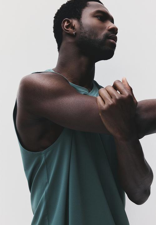 H&M - Regular fit sports vest top with drymove™ - dusty green