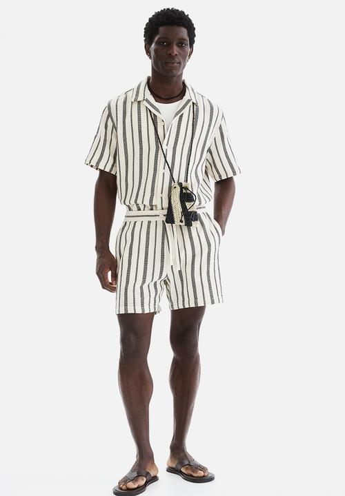 H&M - Regular fit shirt - black/striped