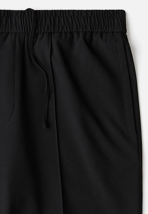 H&M - Regular fit track pants - black
