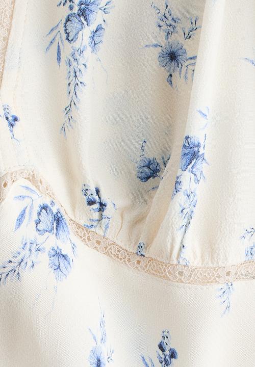 H&M - Long-sleeved viscose dress - white/floral