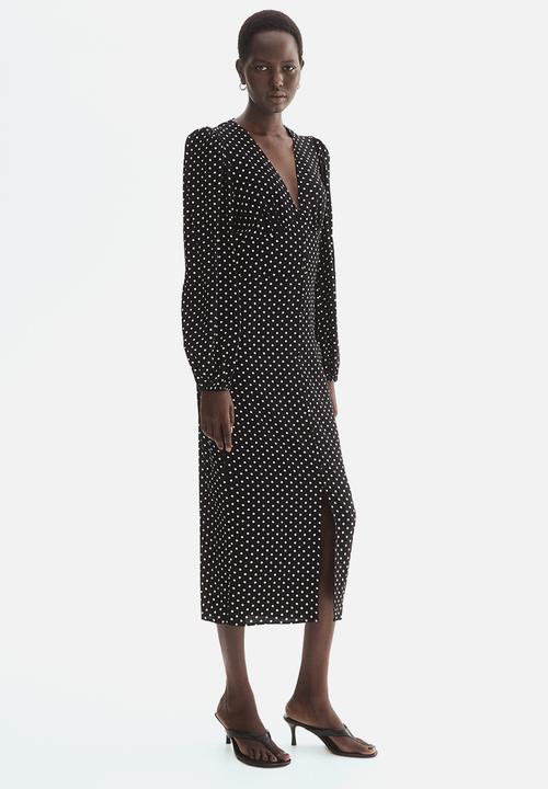 H&M - Long-sleeved viscose dress - black/spotted