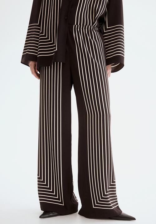 H&M - Pull-on trousers - dark brown/striped