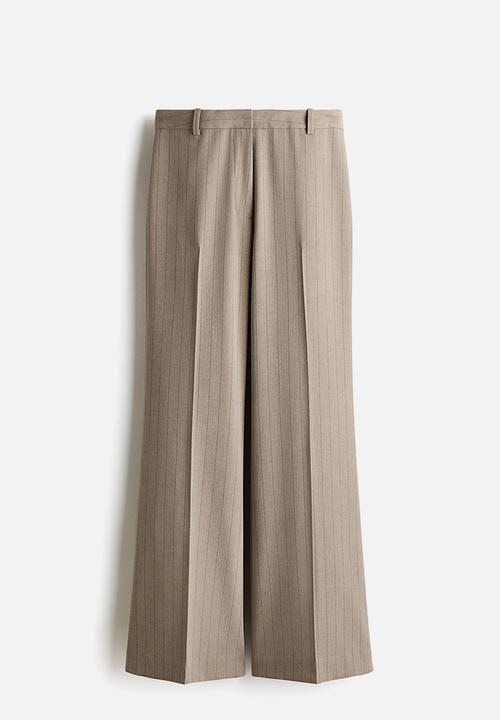 H&M - Flared trousers - greige/pinstriped