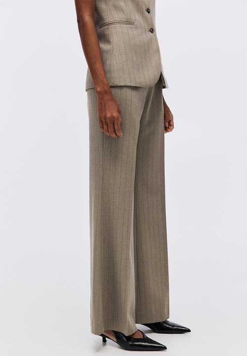 H&M - Flared trousers - greige/pinstriped