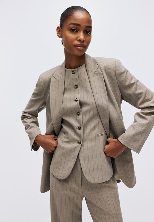 H&M - Flared trousers - greige/pinstriped