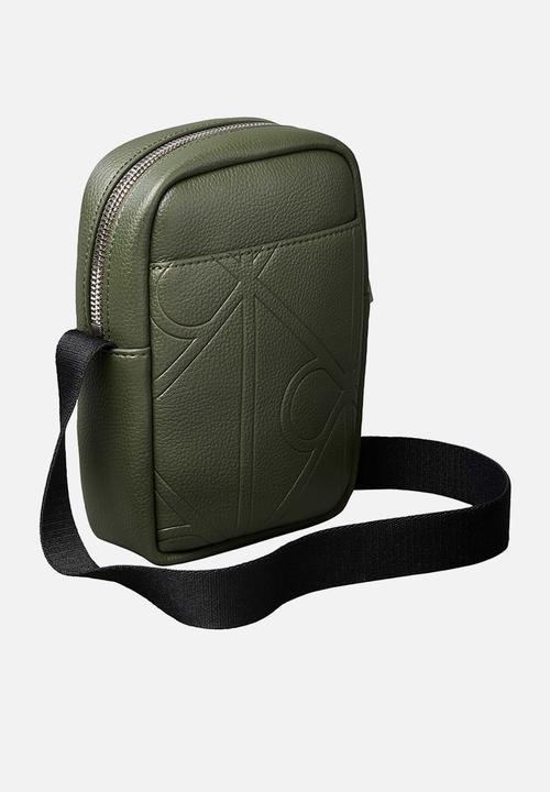 Calvin Klein - Emblem Aop Emboss Slim Reporter - Green