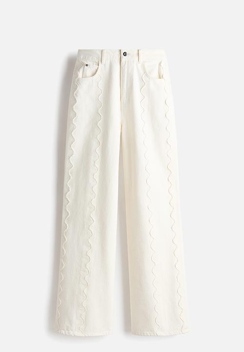 H&M - Flared regular waist jeans - cream