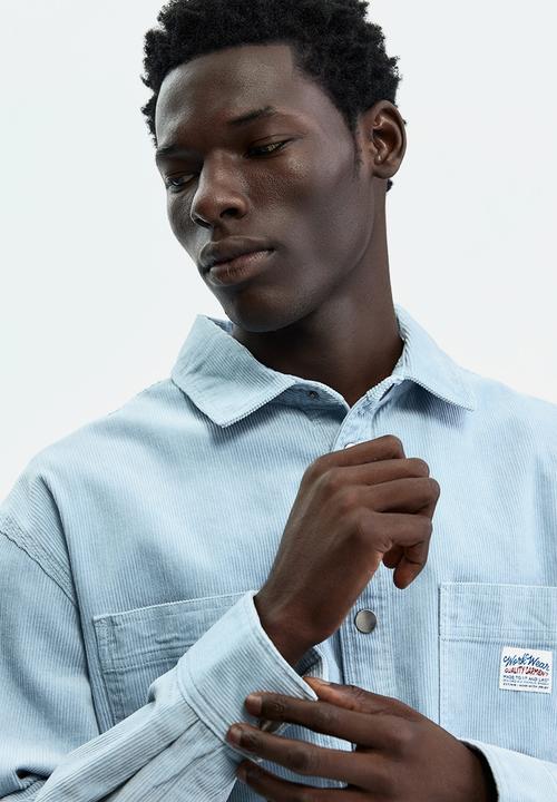 H&M - Oversized cotton corduroy shirt - light blue