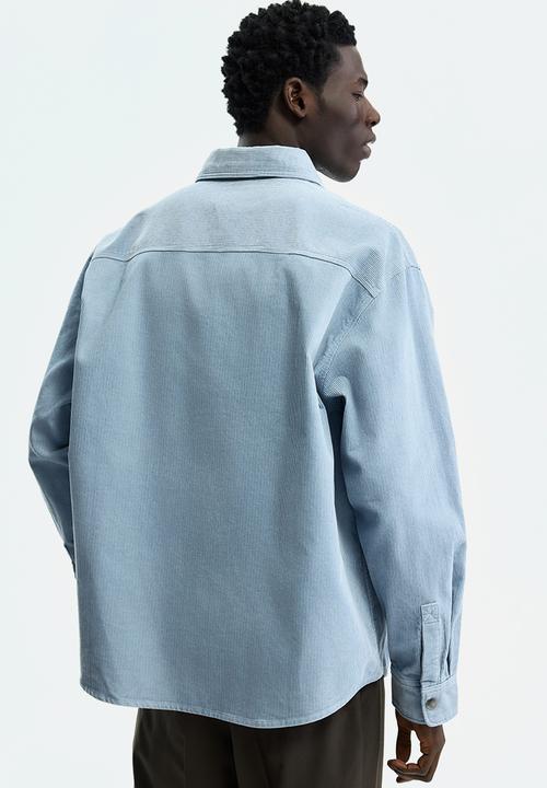 H&M - Oversized cotton corduroy shirt - light blue