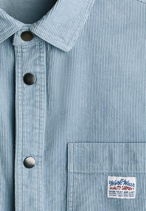 H&M - Oversized cotton corduroy shirt - light blue