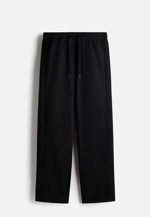 H&M - relaxed fit sports joggers with drymove? - black