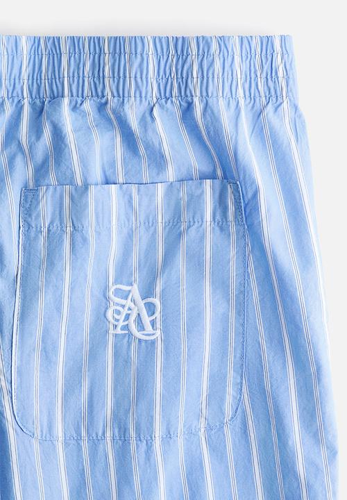 H&M - Relaxed fit trousers - light blue/striped