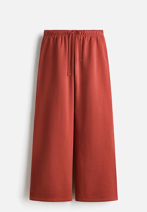 H&M - Wide joggers - rust red