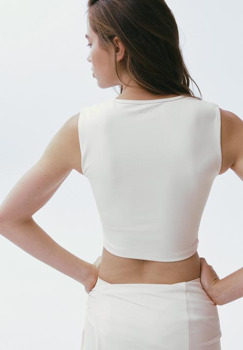 H&M - Sports vest top with sculptmove™ - ivory