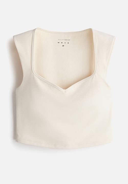 H&M - Sports vest top with sculptmove™ - ivory