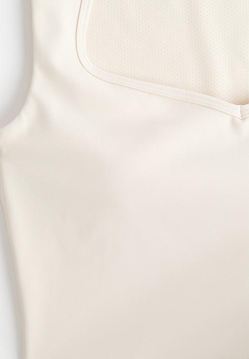 H&M - Sports vest top with sculptmove™ - ivory