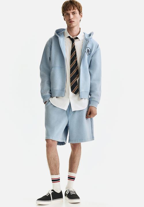 H&M - Relaxed fit shorts - light blue/all sports club