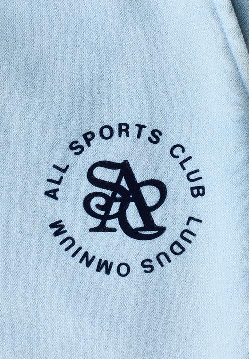 H&M - Relaxed fit shorts - light blue/all sports club