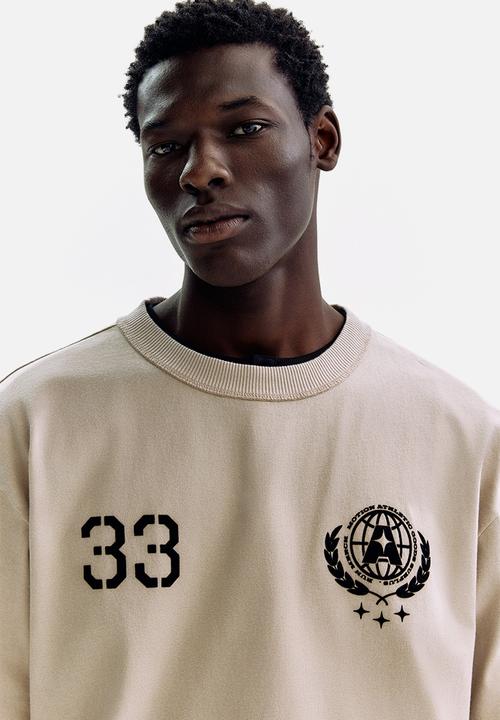 H&M - Printed loose fit t-shirt - beige/33