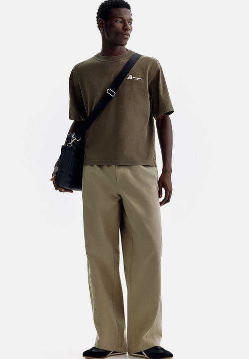 H&M - Printed loose fit t-shirt - brown/athletics co