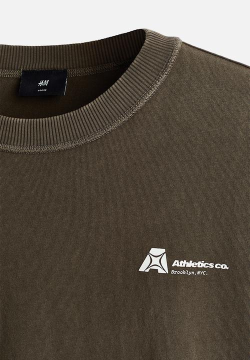 H&M - Printed loose fit t-shirt - brown/athletics co