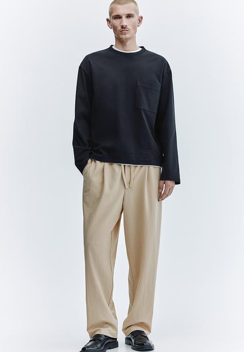 H&M - Regular fit cotton-blend trousers - beige