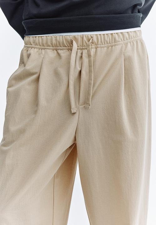 H&M - Regular fit cotton-blend trousers - beige