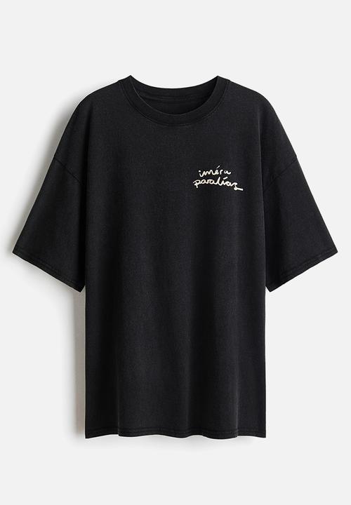 H&M - Oversized print-motif t-shirt - black/iméra paralías