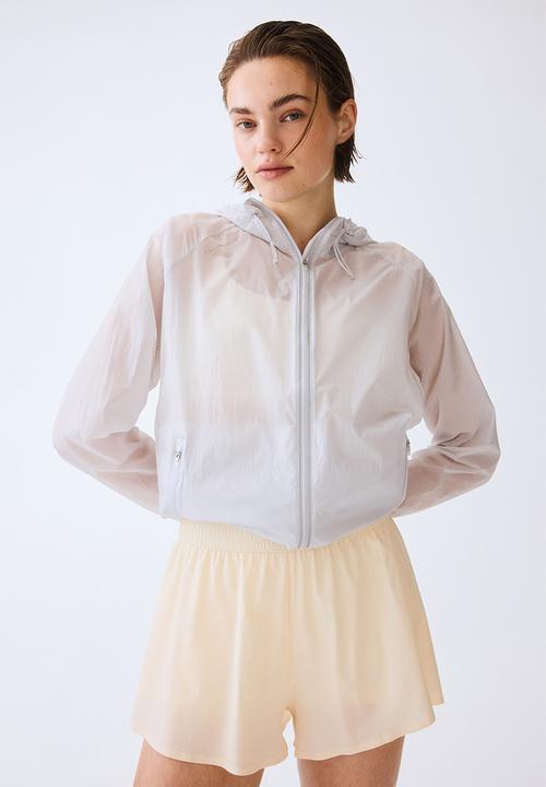 H&M - Layered sports shorts with pocket - butter yellow