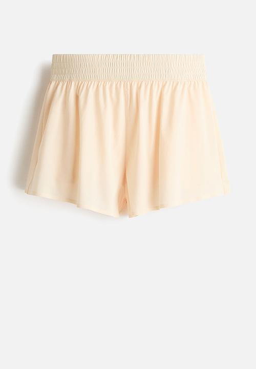 H&M - Layered sports shorts with pocket - butter yellow