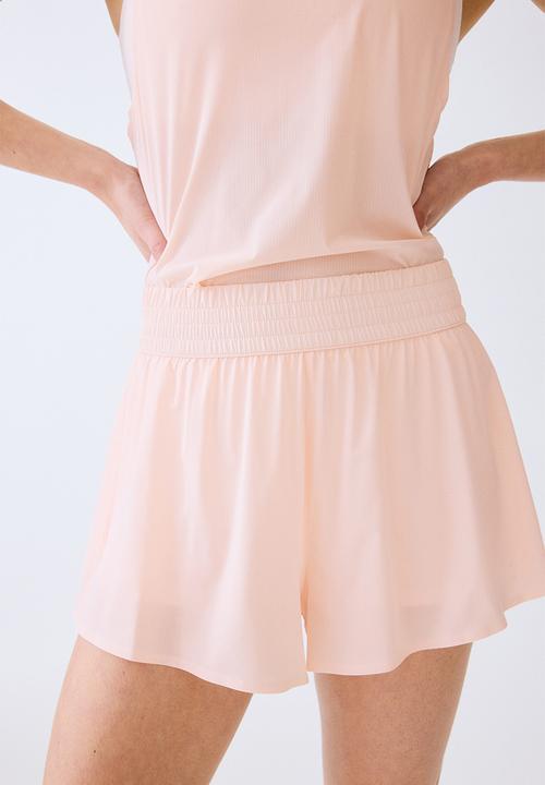 H&M - Layered sports shorts with pocket - blush