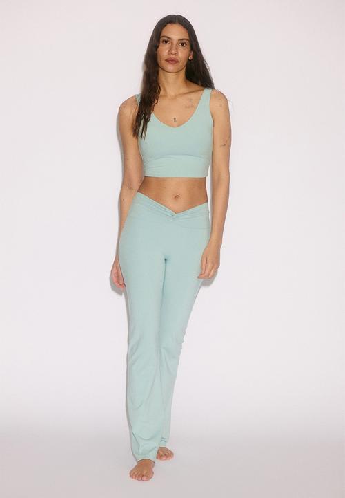 H&M - Flared yoga leggings with softmove™ - amazonite blue