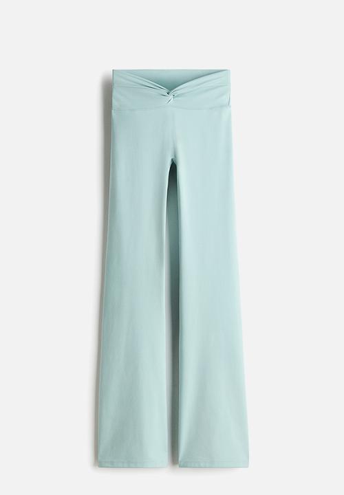 H&M - Flared yoga leggings with softmove™ - amazonite blue