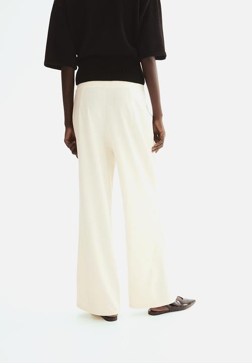 H&M - Ponte di roma trousers - cream