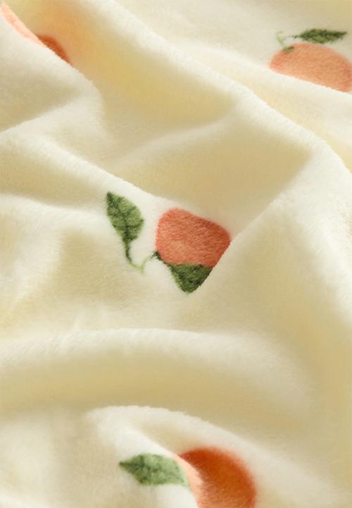 H&M - Patterned fleece blanket - light yellow/oranges