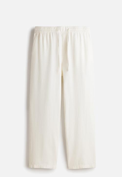 H&M - Relaxed fit linen-blend trousers - white