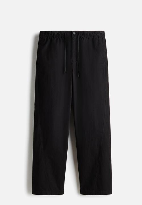 H&M - Relaxed fit twisted trousers - black