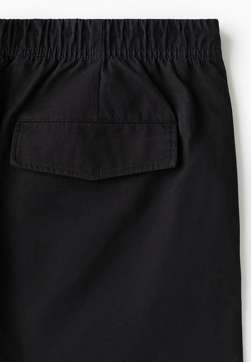 H&M - Relaxed fit twisted trousers - black