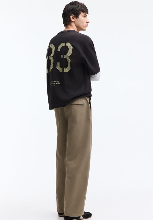 H&M - Relaxed fit twisted trousers - khaki green