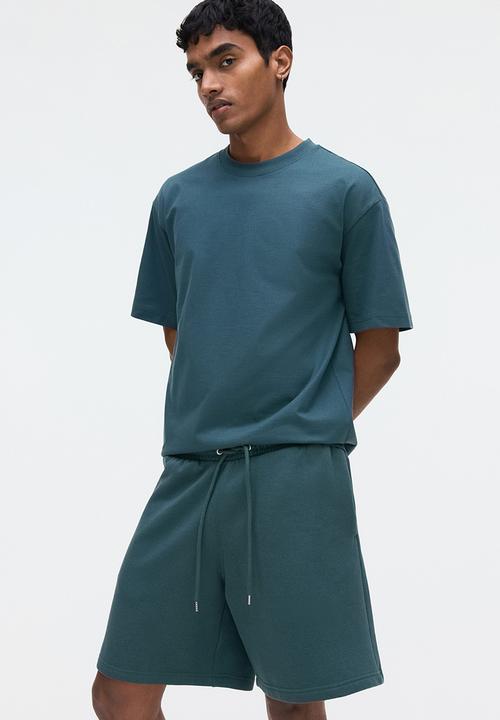 H&M - Regular fit sweatshorts - dark teal