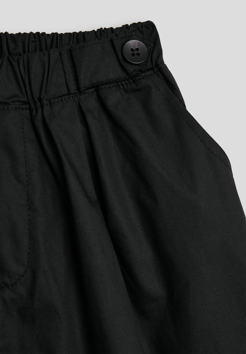 Pop Candy - Flared shorts - eerie black